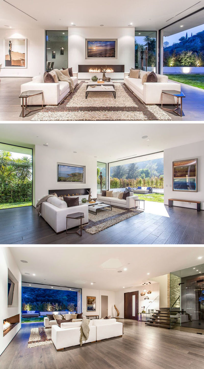 This living room is perfectly symmetrical, making sure there is plenty of room for people to socialize and enjoy the fireplace.