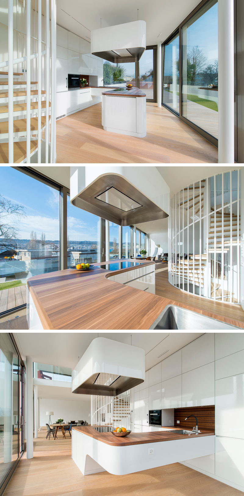 This white kitchen has curved edges and a wooden counter-top.