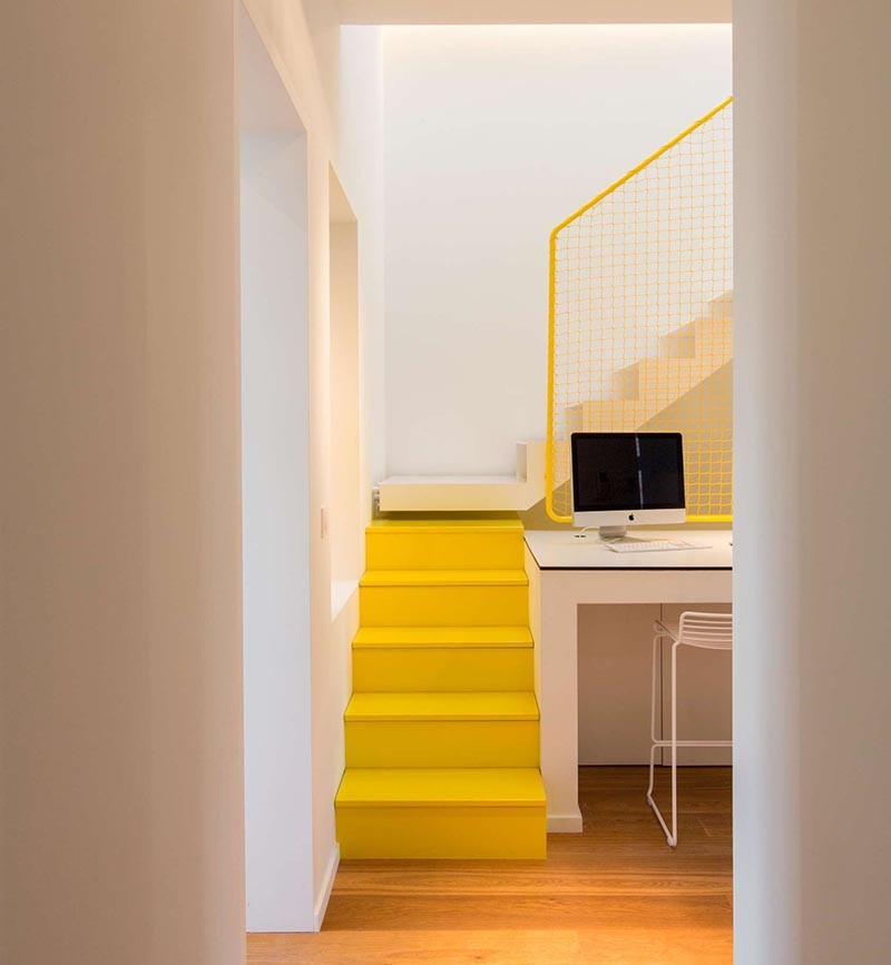 These Bright Yellow Stairs Include Hidden Spaces For Storage