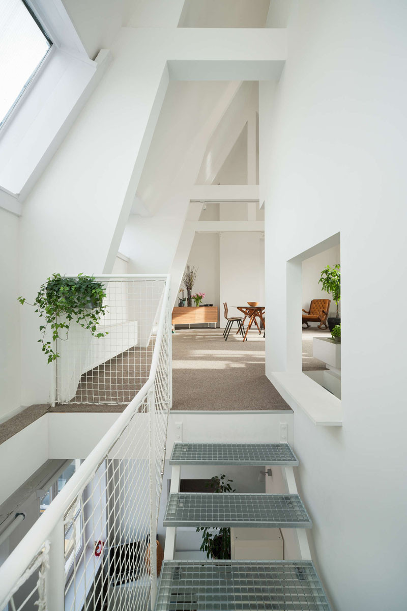 This apartment in Amsterdam has a sunken kitchen