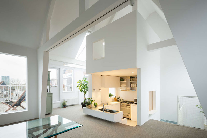 This apartment in Amsterdam has a sunken kitchen