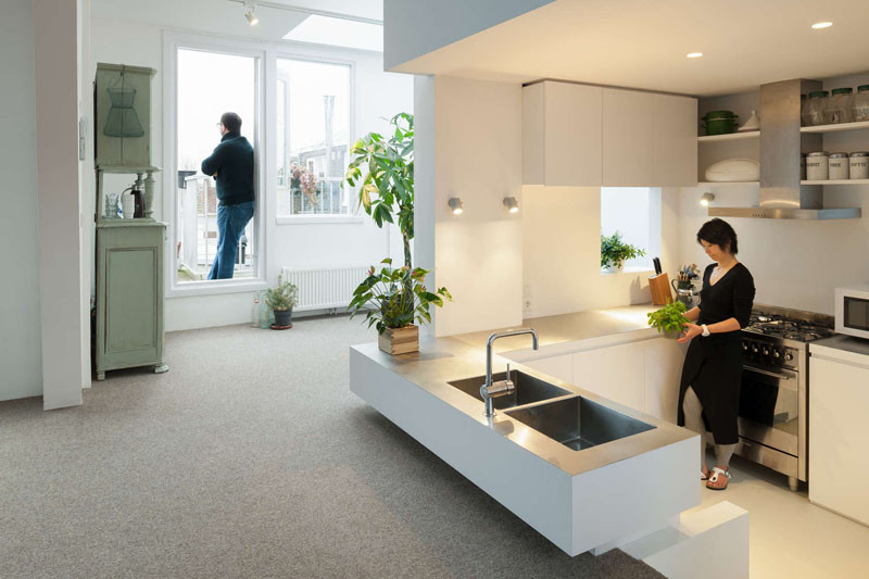 This apartment in Amsterdam has a sunken kitchen