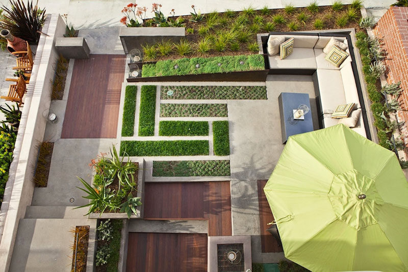 16 Inspirational Backyard Landscape Designs As Seen From Above // This back patio has added lots of greenery and clean lines to keep it modern, but also keep it feeling like a natural, outdoor space. #Backyard #YardIdeas #LandscapingIdeas #YardLayout #YardDesign