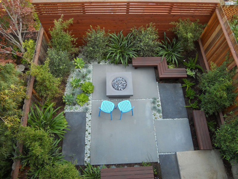 16 Inspirational Backyard Landscape Designs As Seen From Above // Here's a contemporary patio with a mix of low maintenance plants and seating around a fire pit. #Backyard #YardIdeas #LandscapingIdeas #YardLayout #YardDesign