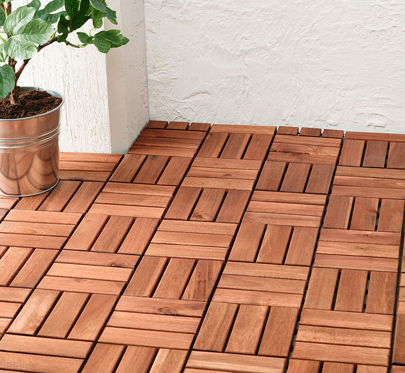 How To Make Your Balcony Awesome For Summer // Wooden floor tiles are an easy way to completely transform the look of a balcony. These modular tiles are really quick to lay, and you can take them with you if you ever move.