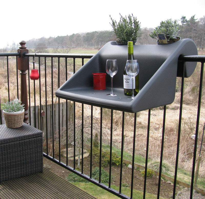 How To Make Your Balcony Awesome For Summer // You might not have enough room for a table, so consider something that can hook over the balcony railing, like this table.