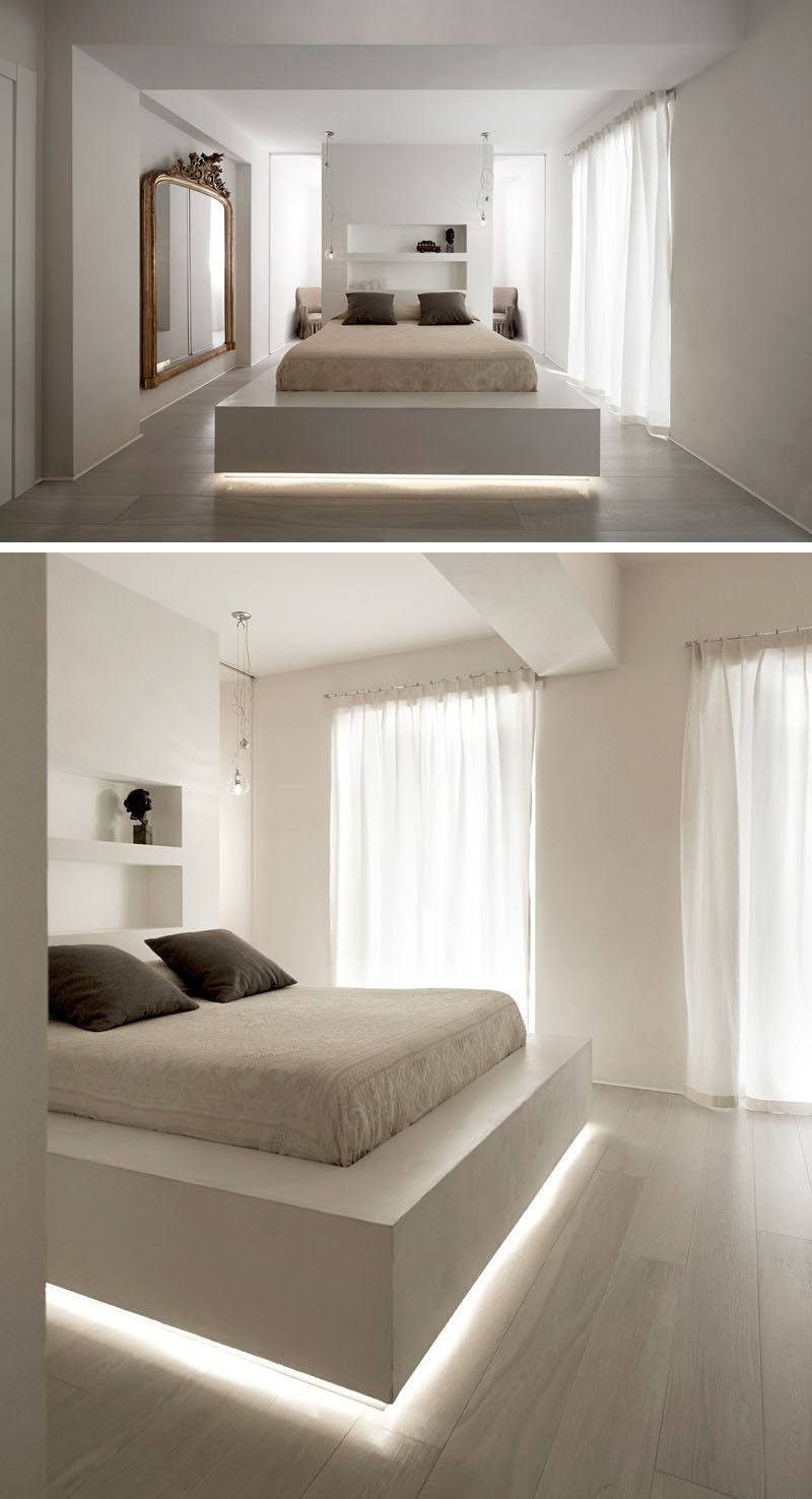 9 Bedrooms With Beds That Feature Hidden Lighting // A strip of LED lights under this bed frame makes the bed appear to float.