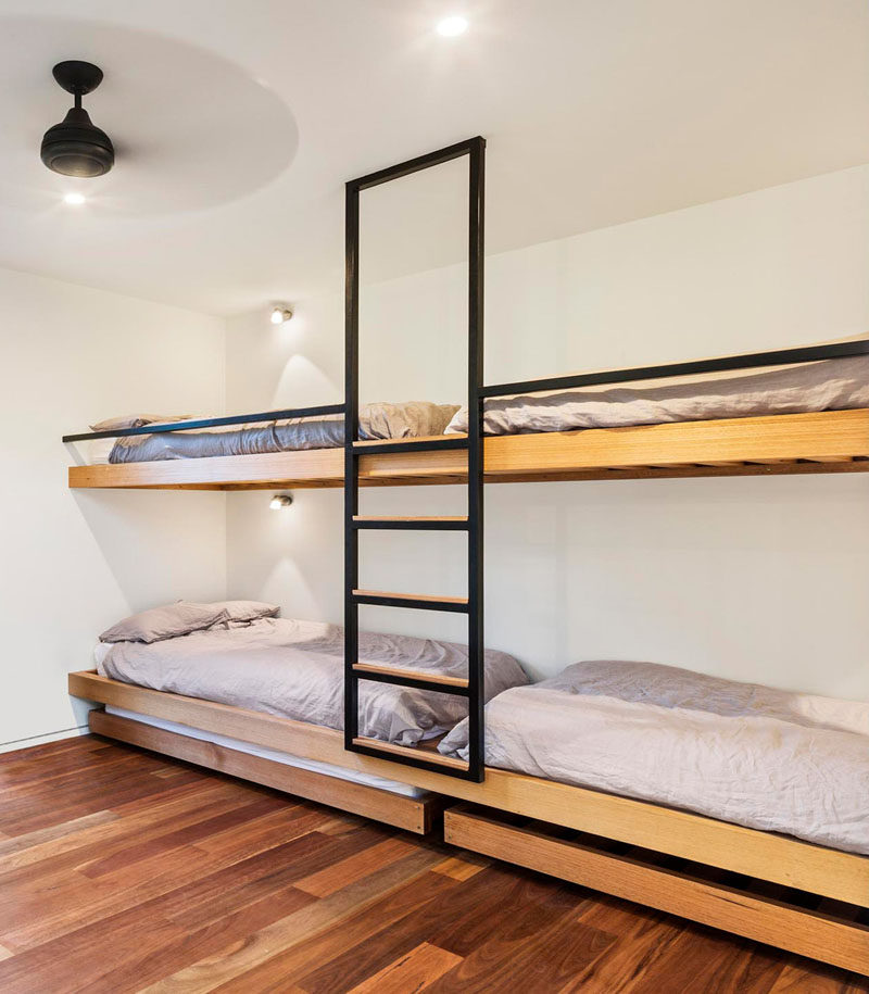 Interior Design Ideas For Sleeping Six People In A Room // These bunk beds designed by ARKit, both have trundle beds that roll out for sleeping extra people.