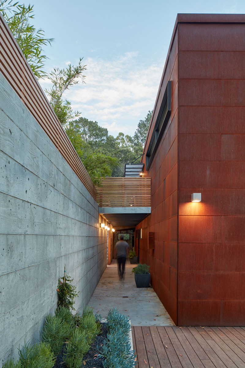 Weathering steel, concrete and wood are key materials on the exterior of this home in California.