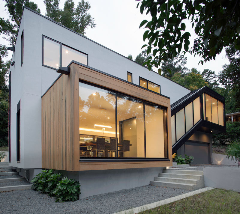 This new contemporary home designed by in situ studio, sits tucked into a sloped lot in Raleigh, North Carolina.