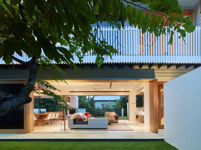 The main living area of this Australian home opens up on the other side to another courtyard with outdoor space.