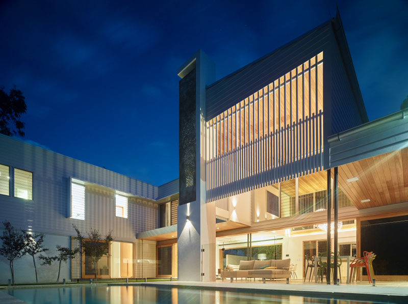 This home in Australia, features a double height ceiling.