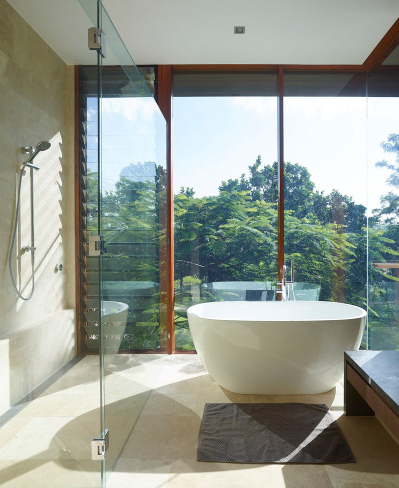 The bathroom has amazing views, that be enjoyed from both the shower and the bath.