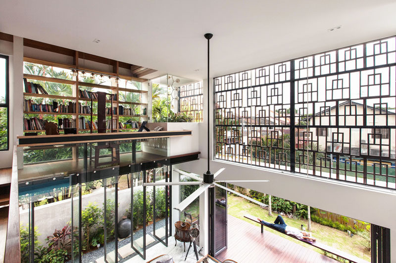 This home has a mezzanine level, home to a library and work area.