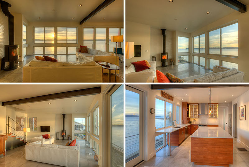 This living room and kitchen share the same space, with an entire wall of windows providing views of Puget Sound.