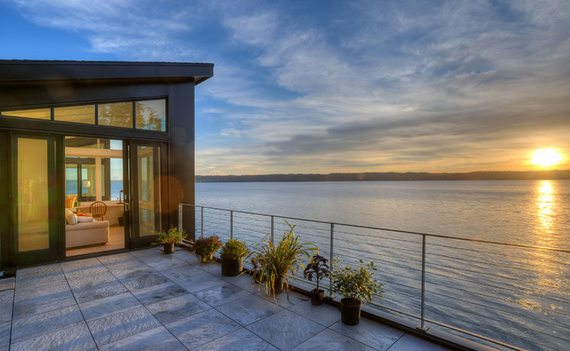 This home on an island in Washington State, has a deck on the top floor, perfect for enjoying sunsets.