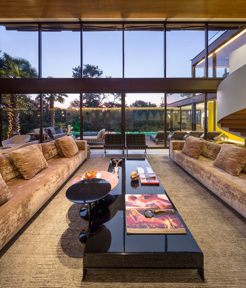 Floor-to-ceiling windows allow for plenty of natural light to fill the living area.