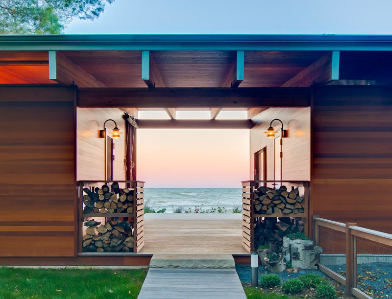 This entrance to a beach cottage gives you a glimpse of the water view beyond.