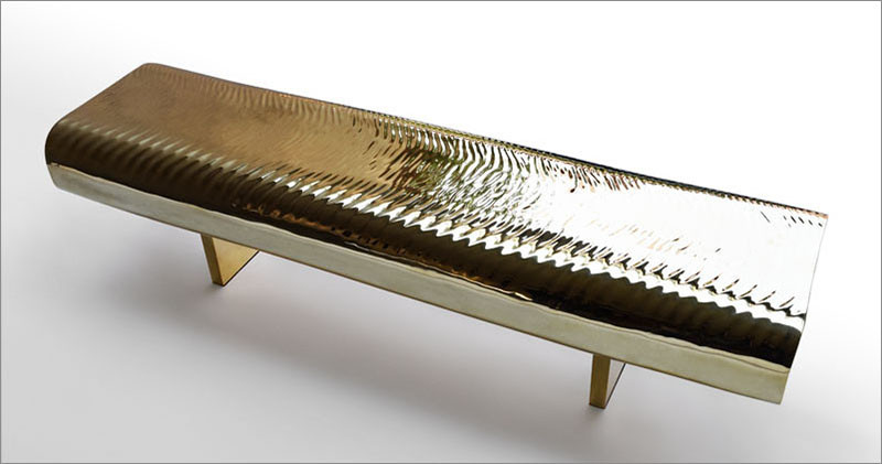 Golden Water-Like Ripples Cover This Brass Bench