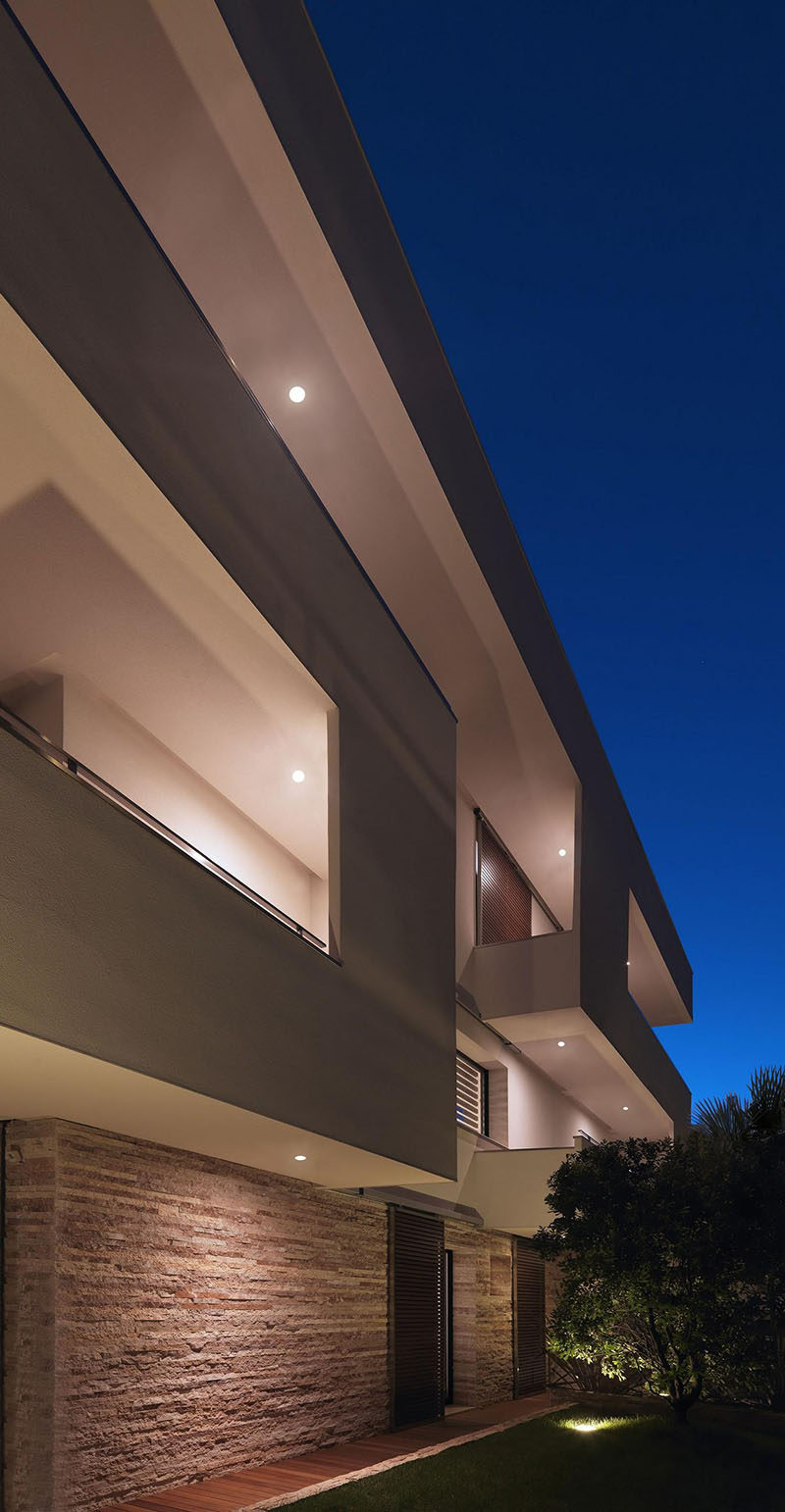 Lighting was added to this home to show off the balconies, and make the home feel more inviting.