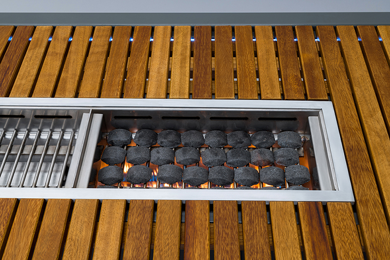 This Outdoor Table Has A BuiltIn BBQ Grill