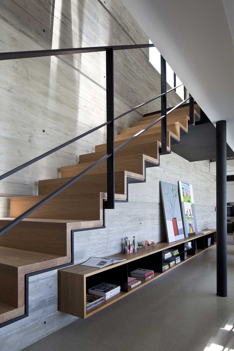 Concrete, Black Steel, And Wood Stairs