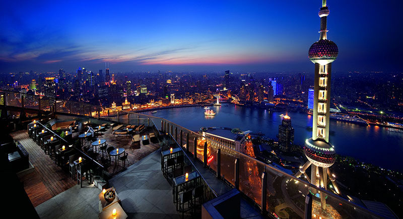 10 Incredible Hotel Rooftops From Around The World // 6. The rooftop of the Ritz-Carlton in Shanghai offers incredible views of the city and is right next to the Oriental Pearl Tower.