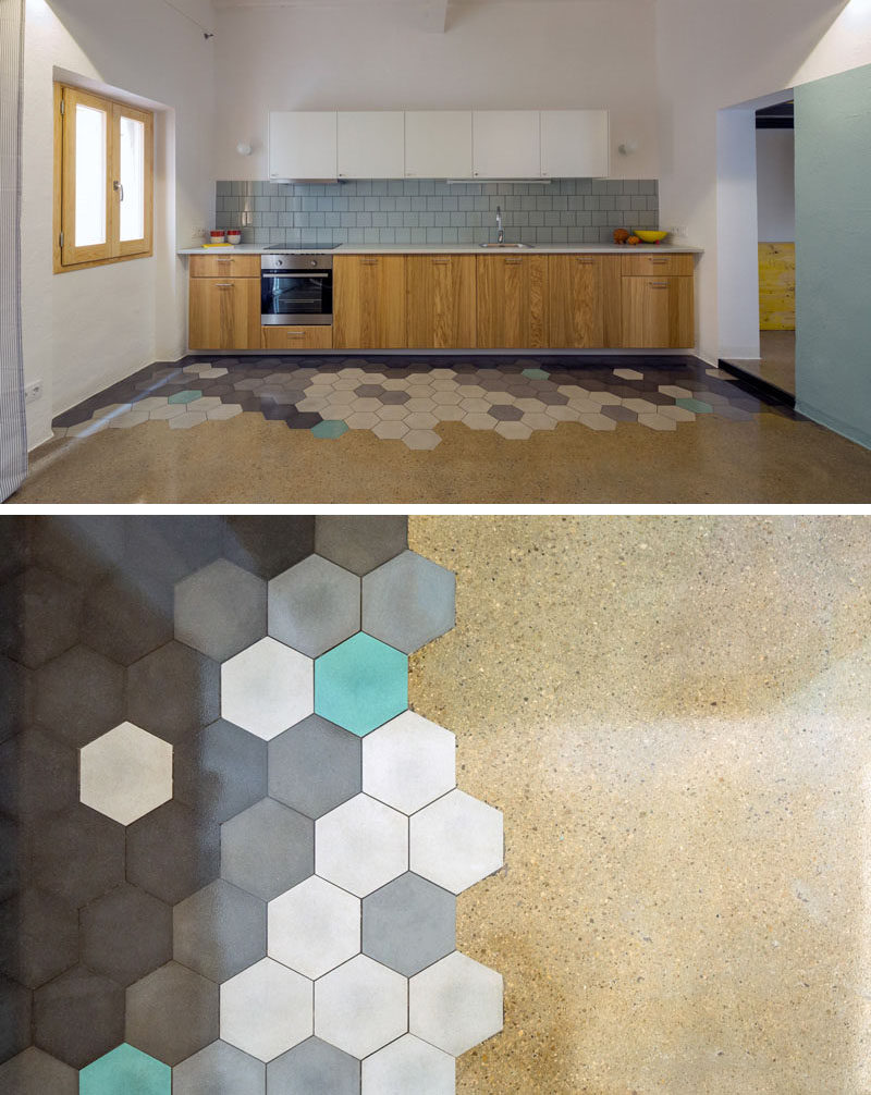 19 Ideas For Using Hexagons In Interior Design And Architecture // The floor in this Barcelona apartment has hexagonal tiles that compliment the blue found throughout the interior.