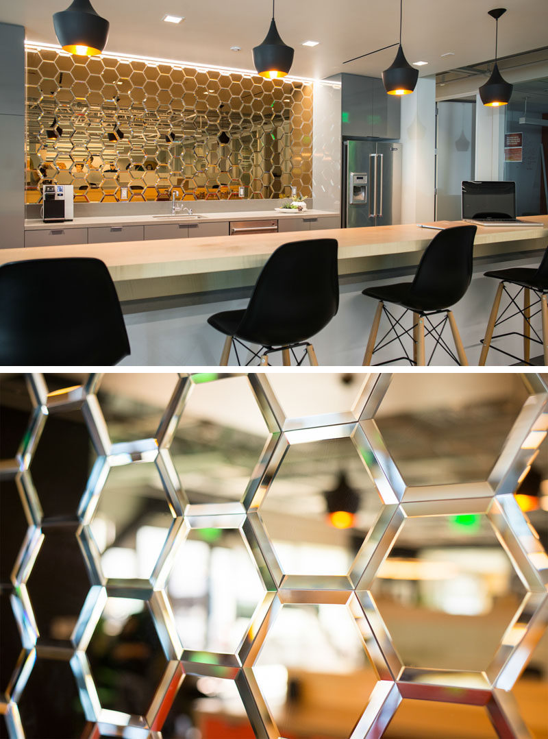 19 Ideas For Using Hexagons In Interior Design And Architecture // Mirrored glass hexagons make up the backsplash of the kitchen area in this LA production studio.