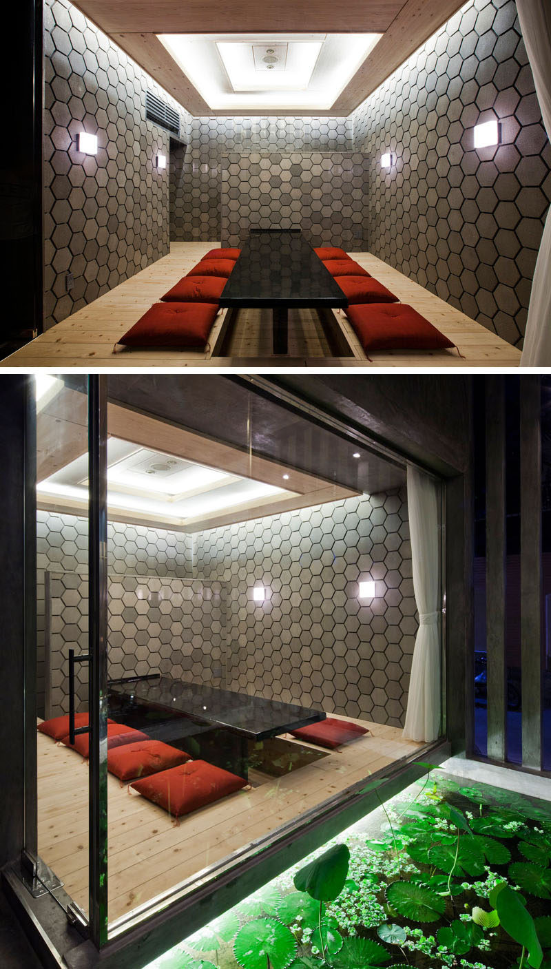 19 Ideas For Using Hexagons In Interior Design And Architecture // The walls of this private annex at sushi restaurant in Vietnam, are made up of dark grey hexagons.