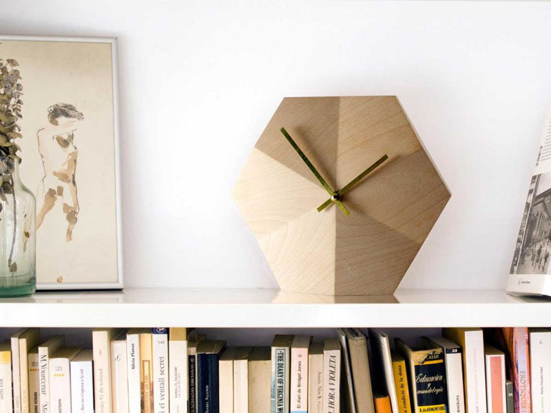 19 Ideas For Using Hexagons In Interior Design And Architecture // This hexagonal wall clock is a great way to bring the trend into your home without covering your walls or floors.