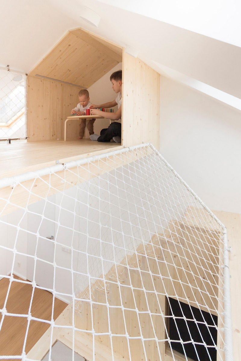 11 Kids Only Hideouts That Even The Biggest Grownups Would Be Jealous Of // This private play area at the top of the stairs is perfect for a kids getaway.