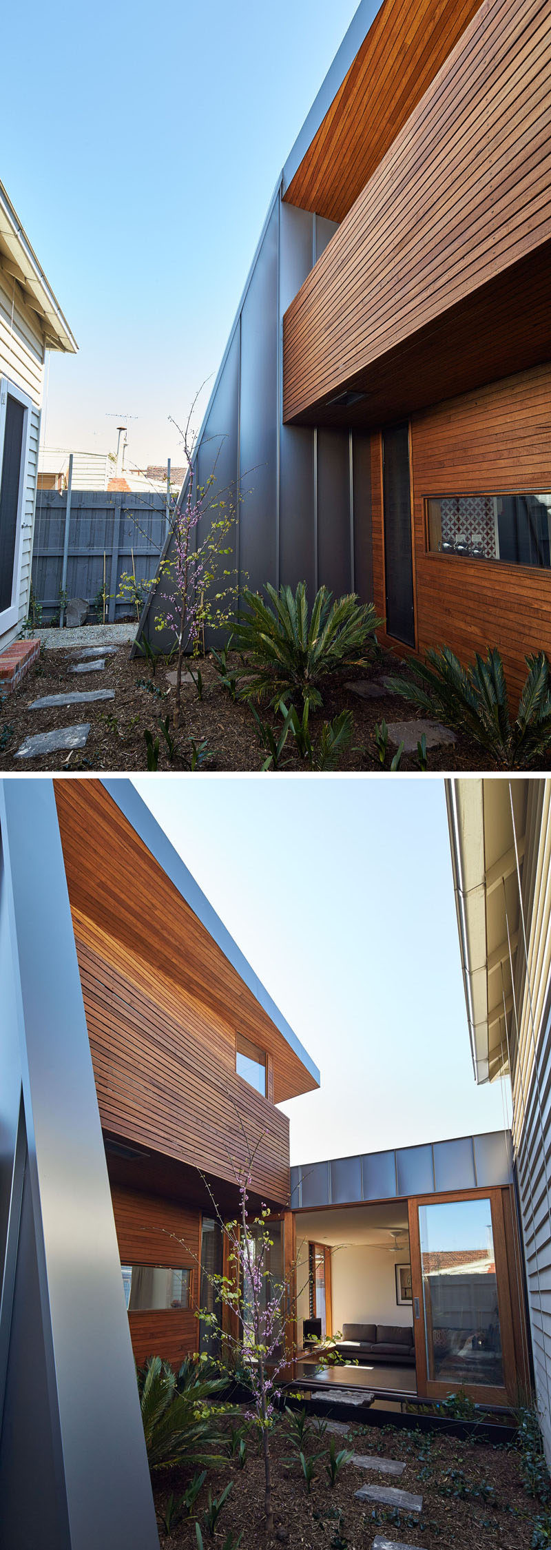 This home has a small path leading to a living room that separates the original home from the new extension.