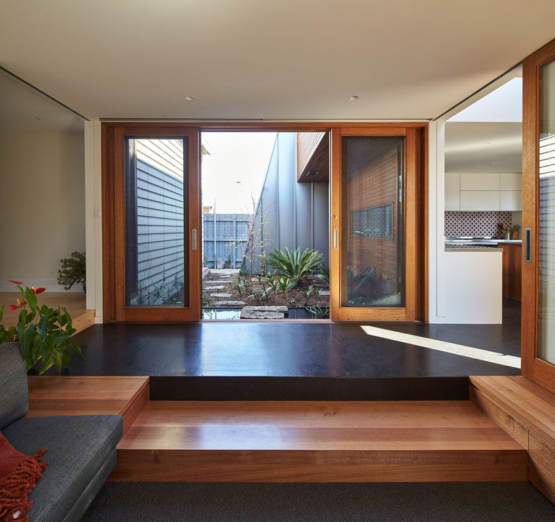 This living room is stepped down from the main hallway of the home.