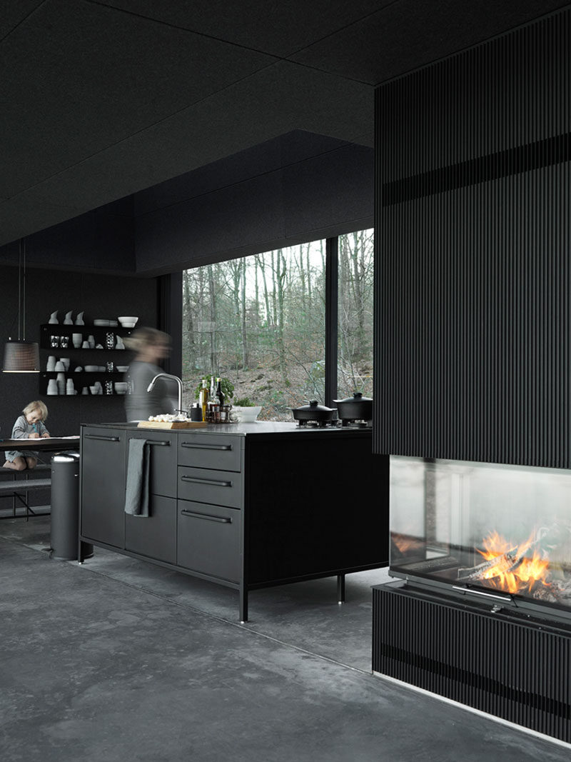 10 Examples Of Monochromatic Interiors // The Vipp Shelter has a completely black interior including the kitchen.