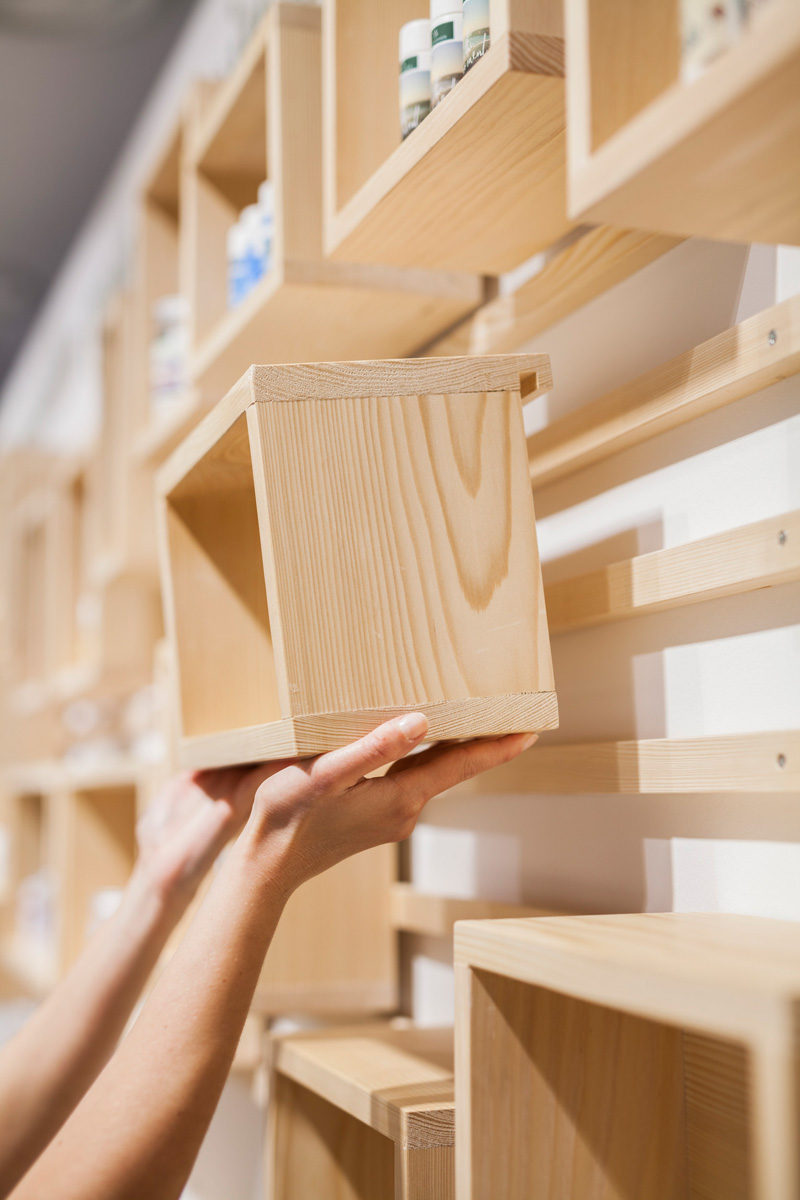 This wooden shelf design is from a retail cosmetics store.