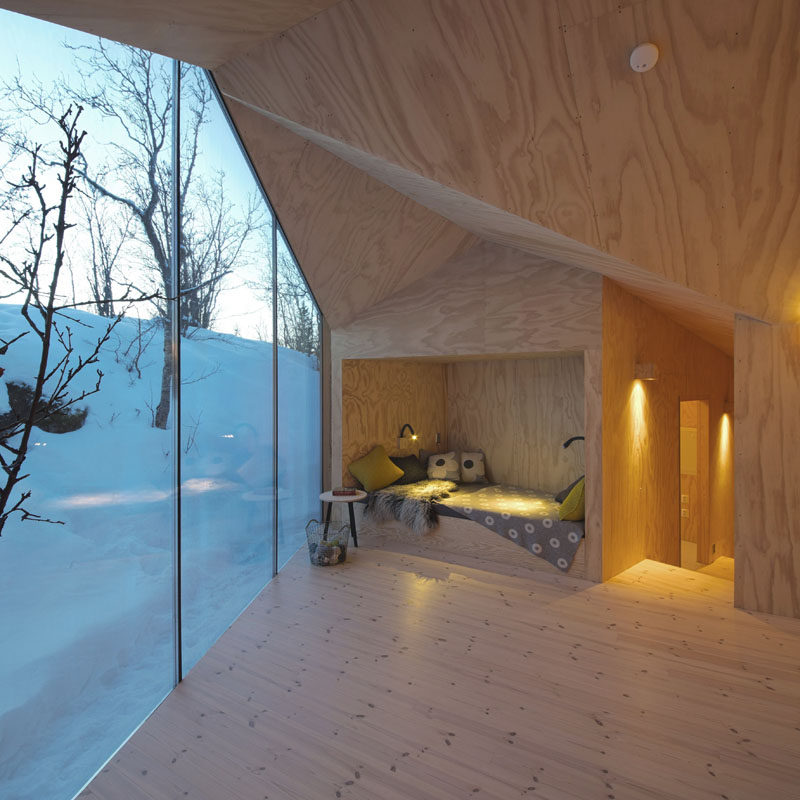 10 Reading Nooks Perfect For Curling Up In // This little nook in a Norwegian cabin is a perfect place to snuggle into with a good book and mug of hot chocolate.