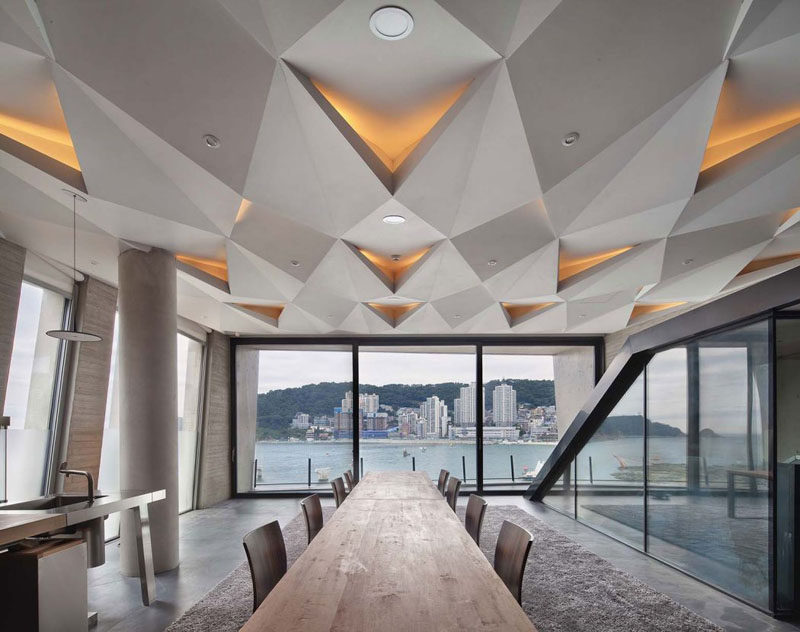 13 Amazing Examples Of Creative Sculptural Ceilings // The sculptural geometric design of this ceiling makes the room almost space-like.