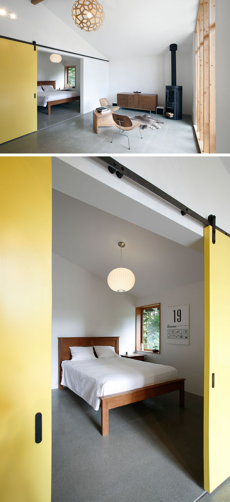 Large yellow sliding barn doors close off this minimalist bedroom from the main space.