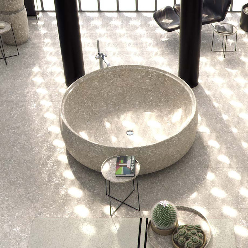 8 Stunning Examples Of Stone Bathtubs // The GRAL tub by SIGN, is carved from a single excavated solid piece of stone.