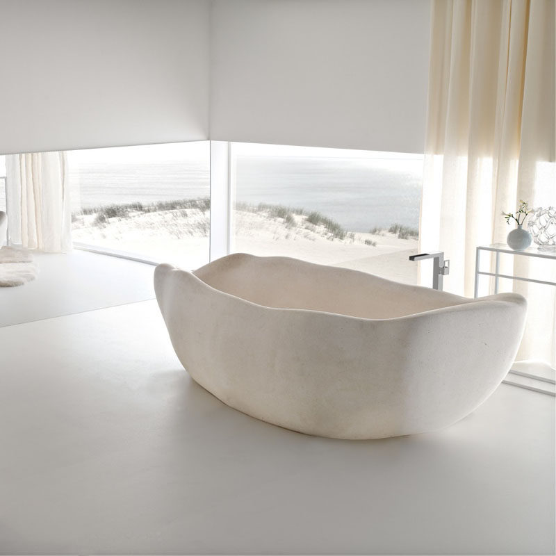 8 Stunning Examples Of Stone Bathtubs // Le Acque tub is a limited edition bathtub designed by Claudio Silvestrin for Toscoquattro, and is made from Supai stone.