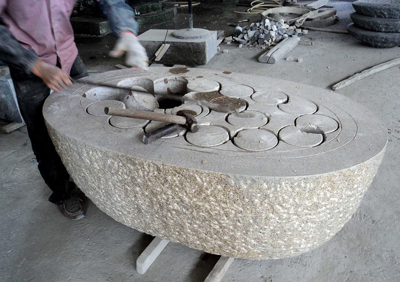 8 Stunning Examples Of Stone Bathtubs // The early stages of how a stone bathtub is made.