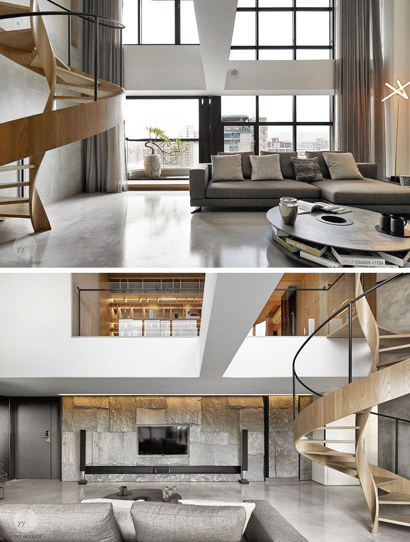 Located off to the side of this living room, is a twisted staircase that almost doubles as a sculptural art piece.