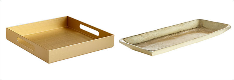 Add a contemporary touch to your home decor with these gold trays.