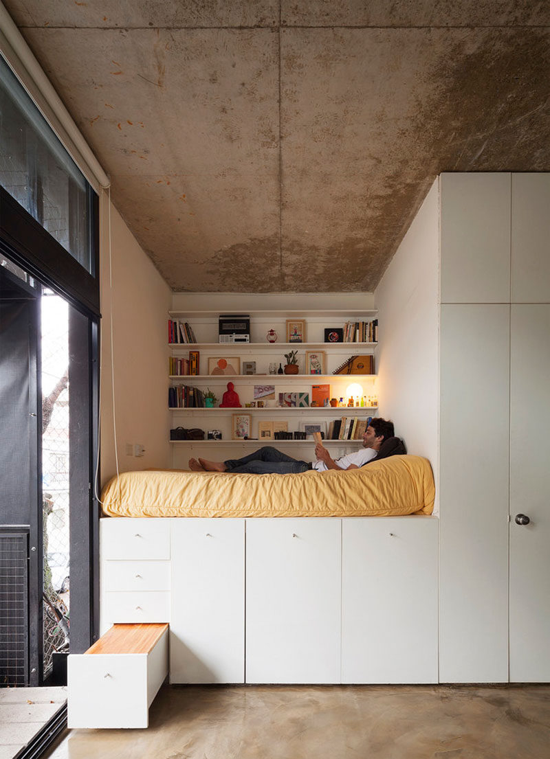 9 Ideas For Under-The-Bed Storage // This bed takes built in storage to a whole new level. Drawers, cupboards, and shelves all surround this bed making it the perfect spot to store all your things.