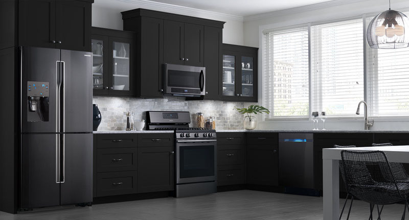 Make a statement in the kitchen with black stainless steel appliances. #BlackAppliances #BlackKitchen #BlackFridge #BlackOven #BlackDishwasher