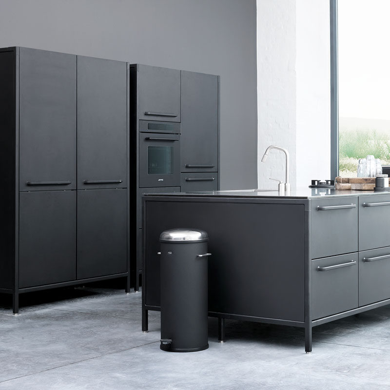 Garbage cans may not be the most exciting element of a kitchen but they're certainly necessary. A statement black one adds flair to your kitchen and creates a stylish home for your trash. #BlackGarbageBin #BlackTrashCan #BlackKitchen