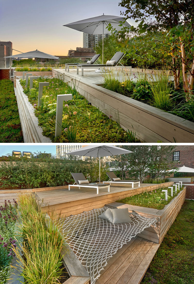 12 Ideas For Including Built-In Wooden Planters In Your Outdoor Space // These planters on a Chicago rooftop deck provide plenty of room for greenery and they separate to provide space for a hammock. #WoodPlanters #BuiltInPlanters #Landscaping #LandscapeDesign #BackyardPlanters #YardIdeas