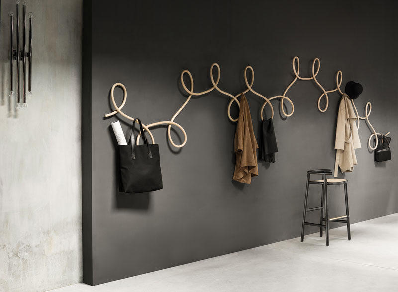 This modular wooden coat hanger is inspired by the ballroom dance, the Waltz.