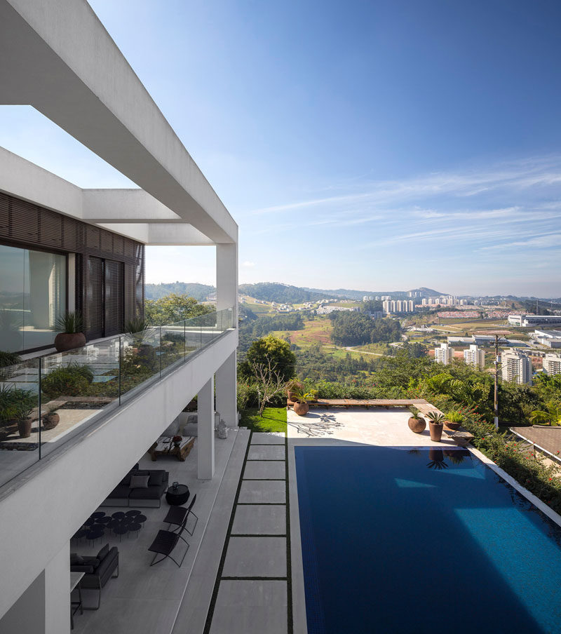 This home, with a landscaped yard and swimming pool, has sweeping views of the outskirts of Sao Paulo, Brazil.